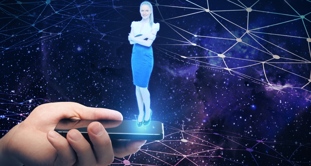 Holographic projection of a lady speaking online from a smartphone.